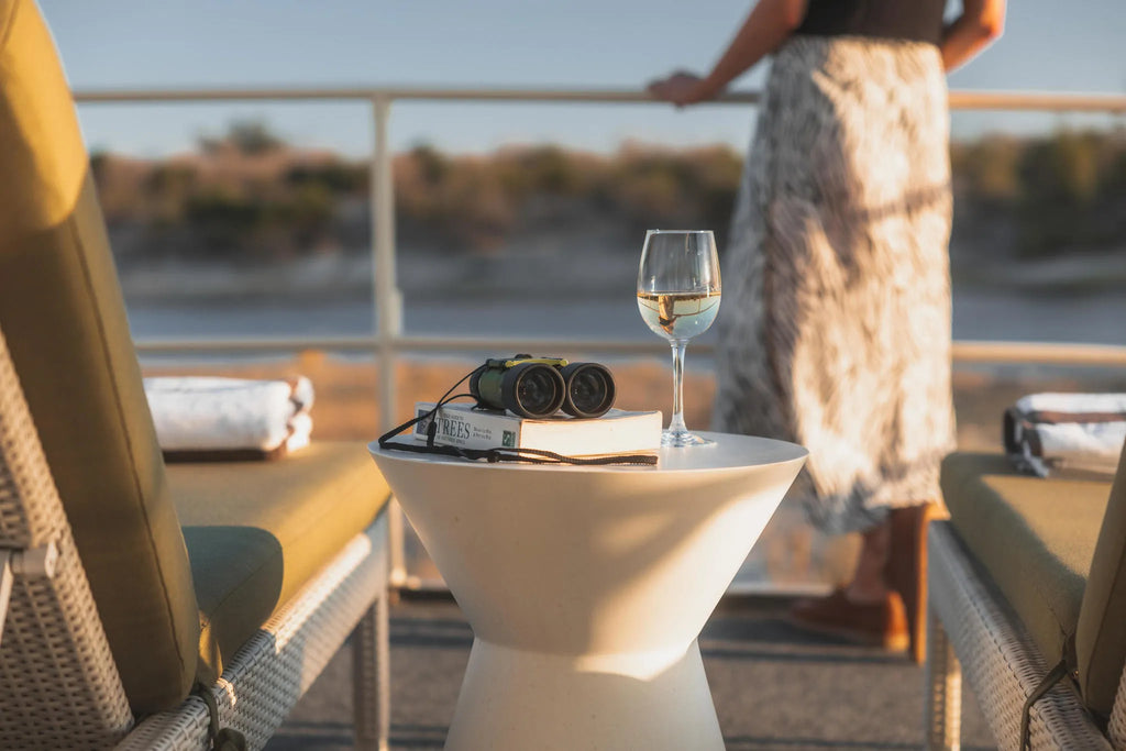Chobe Princess Guest looking at the view at Chobe Princess By Mantis, Chobe River Front Namibia, Namibia.