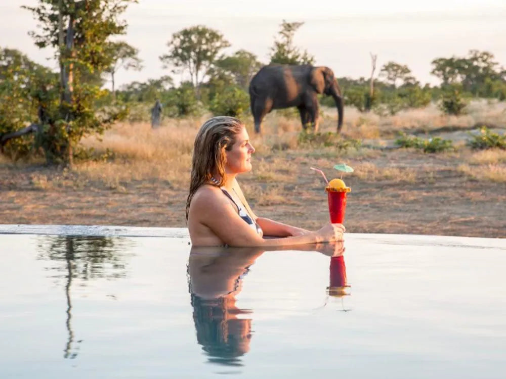 Swimming pool at Hideaways Camp Kuzuma, Chobe, Kazuma Forest Reserve, Botswana.