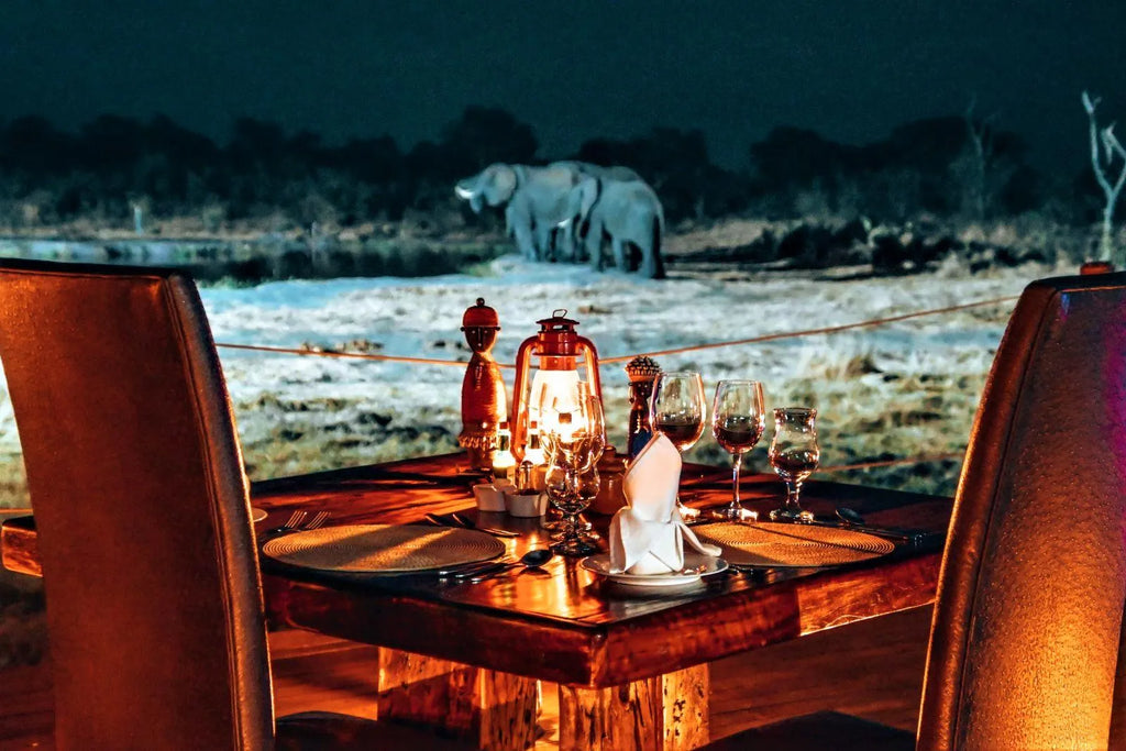 Outdoor dining at Hideaways Camp Kuzuma, Chobe, Kazuma Forest Reserve, Botswana.