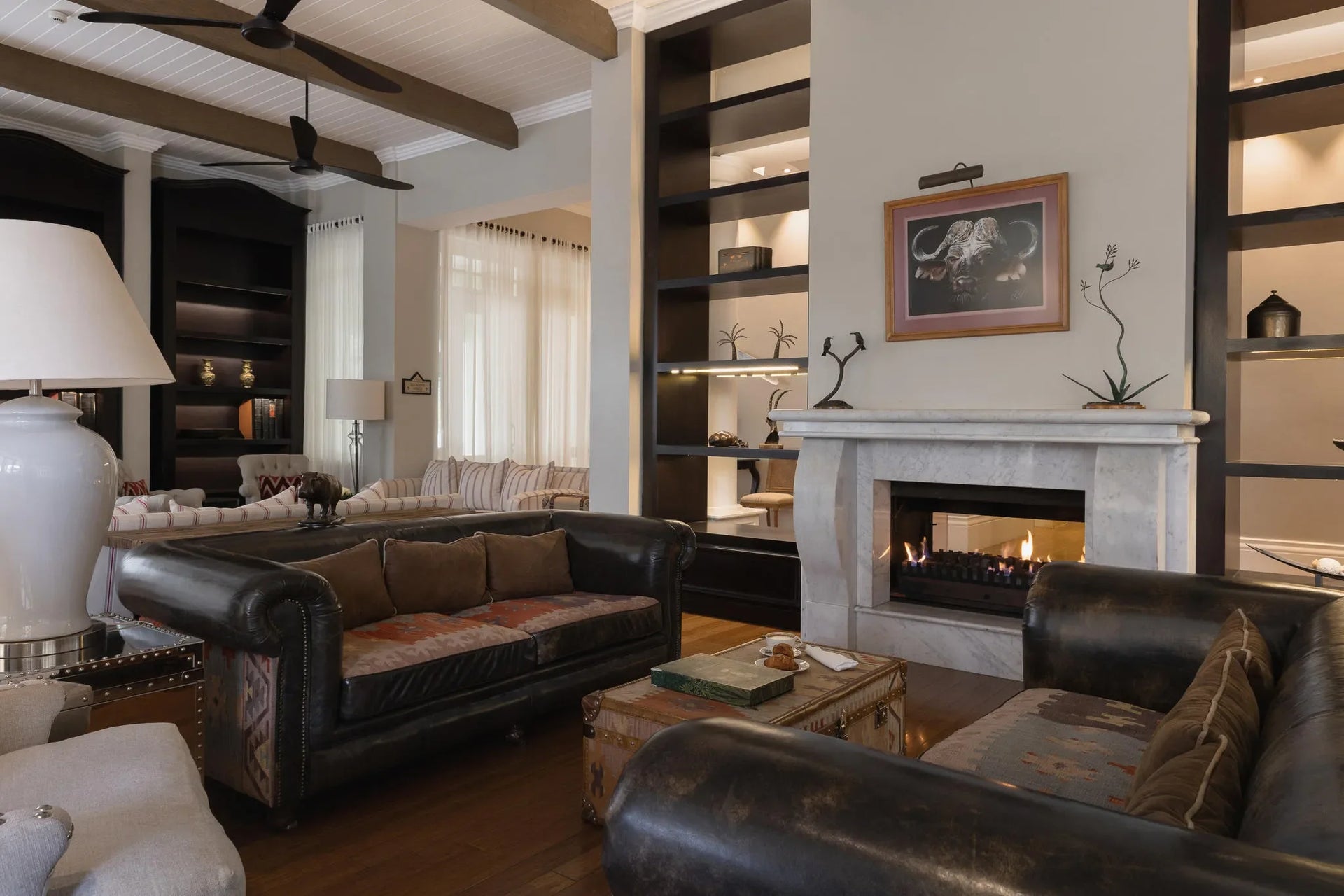 Lounge with fireplace at Hemingways Nairobi, Nairobi, Kenya.