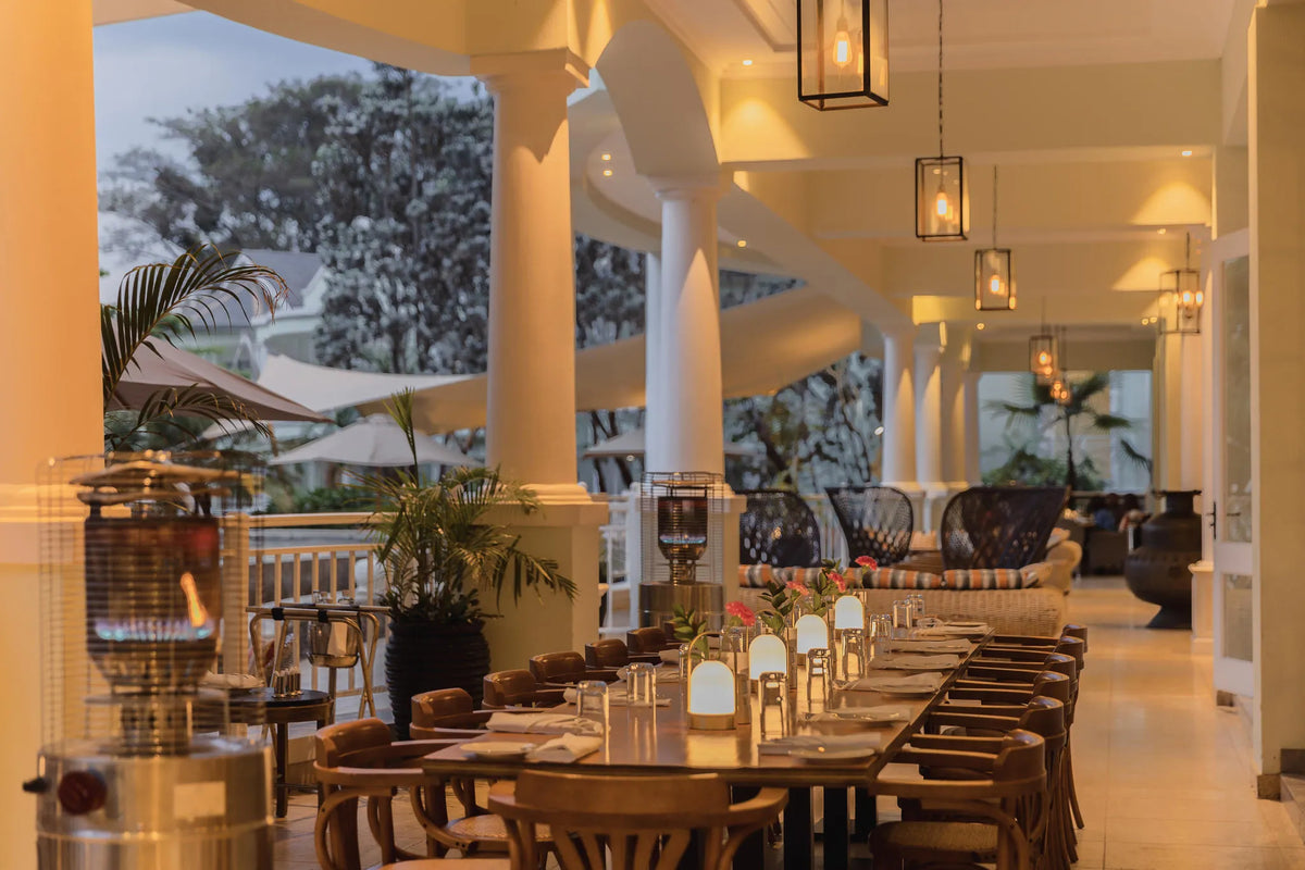 Outdoor Dining at the Terrace at Hemingways Nairobi, Nairobi, Kenya.