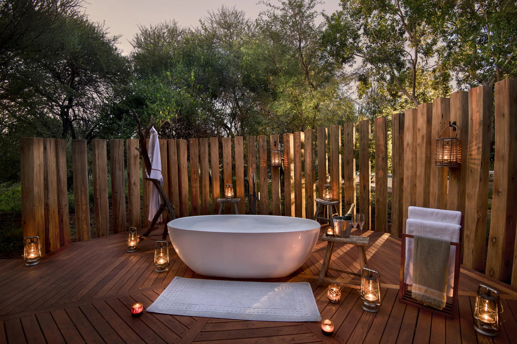 Morukuru Farm House - outdoor bath at room nr 5 at Morukuru Farm House, Madikwe Game Reserve, South Africa.