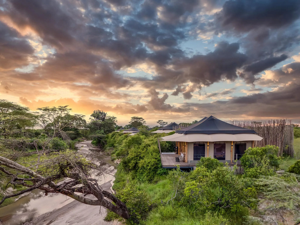Sunset view tent overlooking Talek river at JW Marriott Masai Mara Lodge, Masai Mara, Kenya.