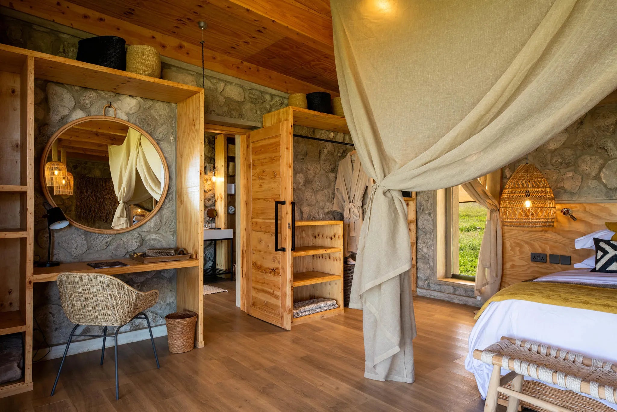 Asilia Africa - Namiri Plains Retreats - Guest vanity and Bathroom Entrance at Retreats at Namiri Plains, Eastern Serengeti.