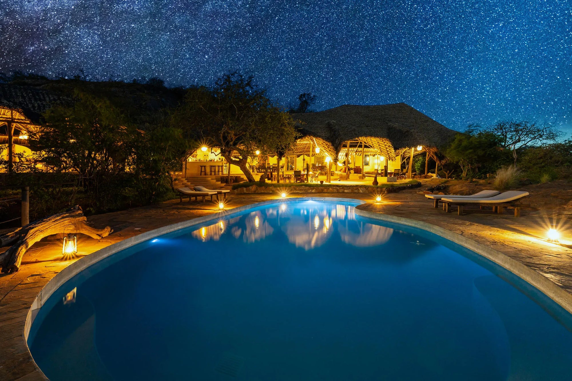 Kipalo Hills. mess area and pool by night at Kipalo Hills, Tsavo West National Park, Kenya.