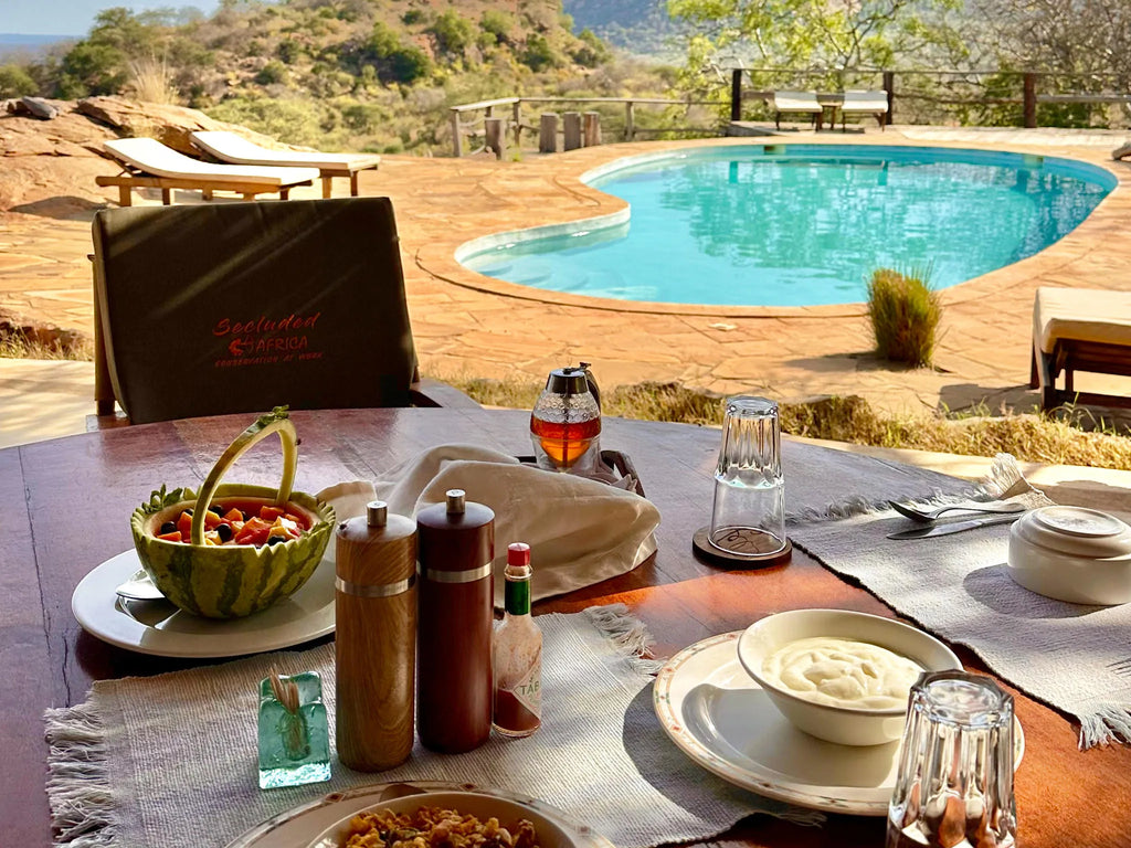 Kipalo Hills, breakfast with view to the pool at Kipalo Hills, Tsavo West National Park, Kenya.