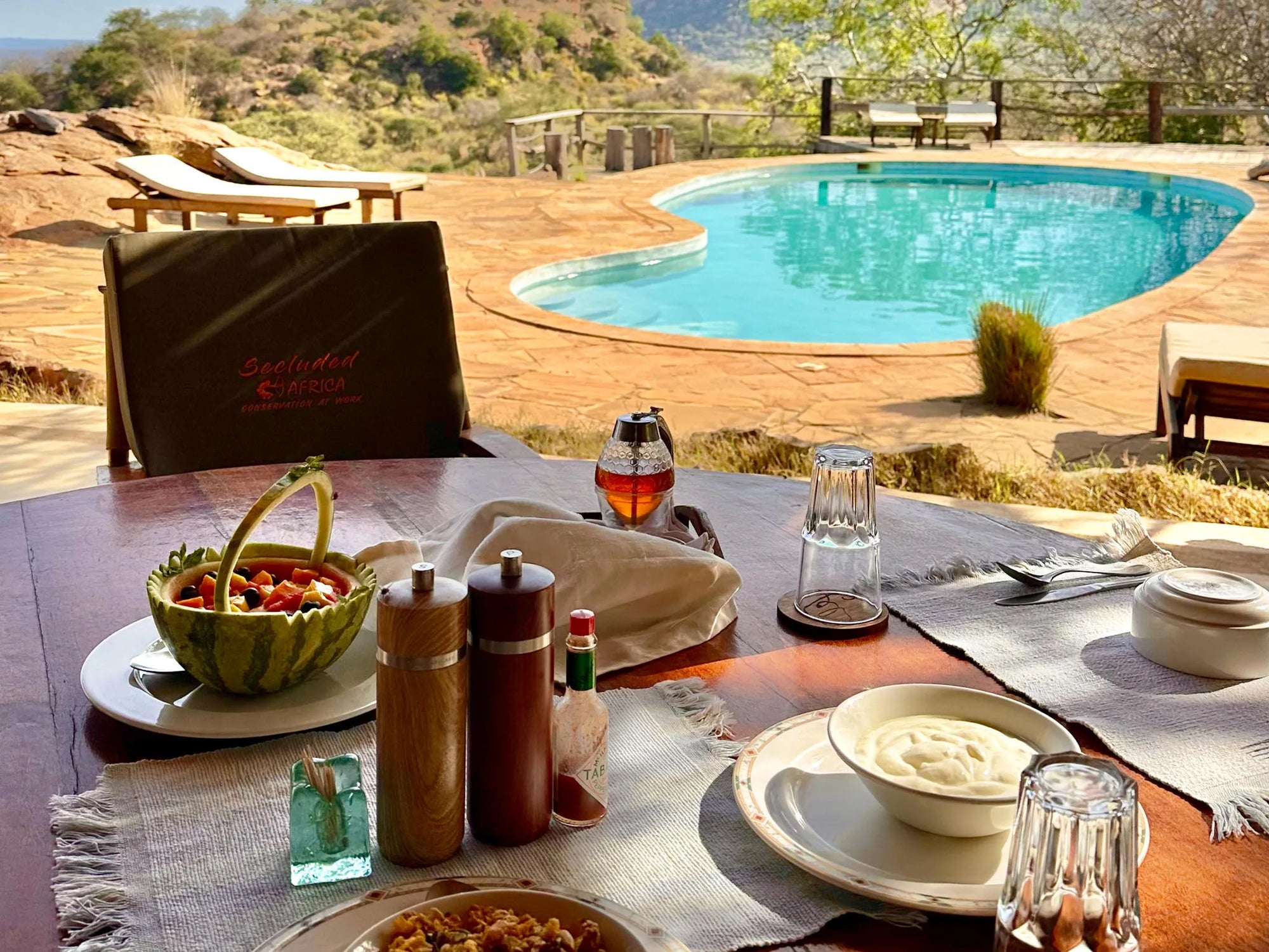 Kipalo Hills, breakfast with view to the pool at Kipalo Hills, Tsavo West National Park, Kenya.