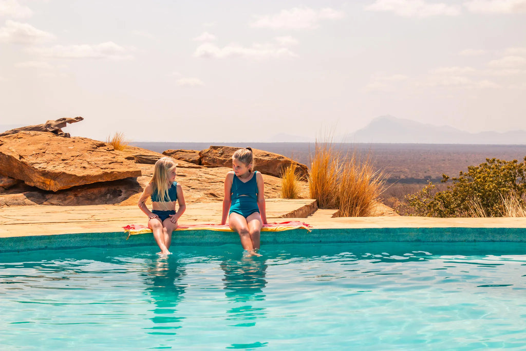Kipalo Hills, pool, kids at Kipalo Hills, Tsavo West National Park, Kenya.