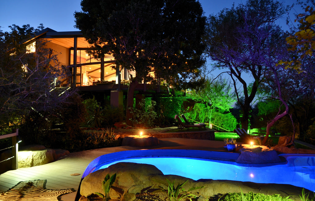 Main Lodge and pool by night