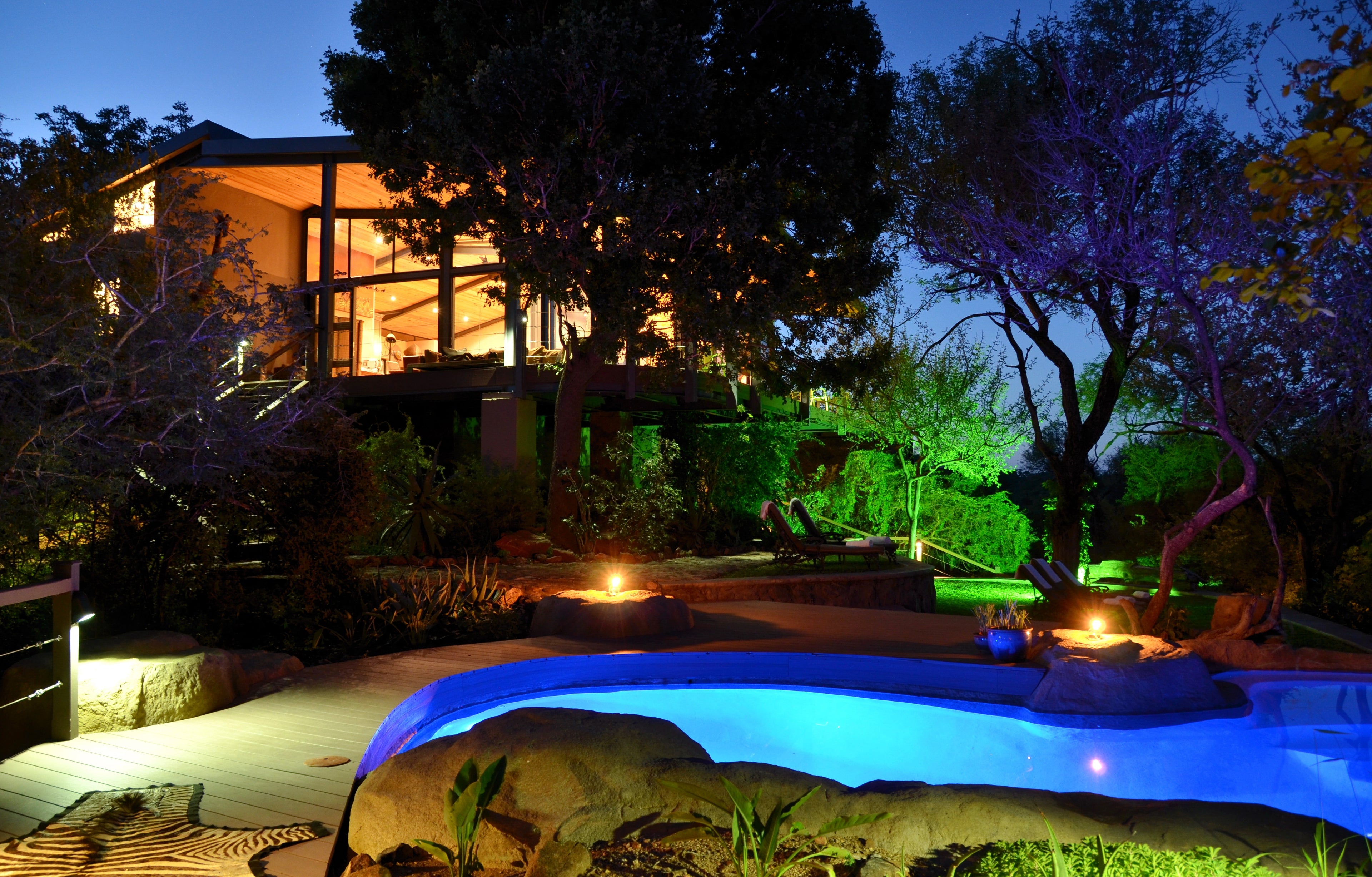 Main Lodge and pool by night