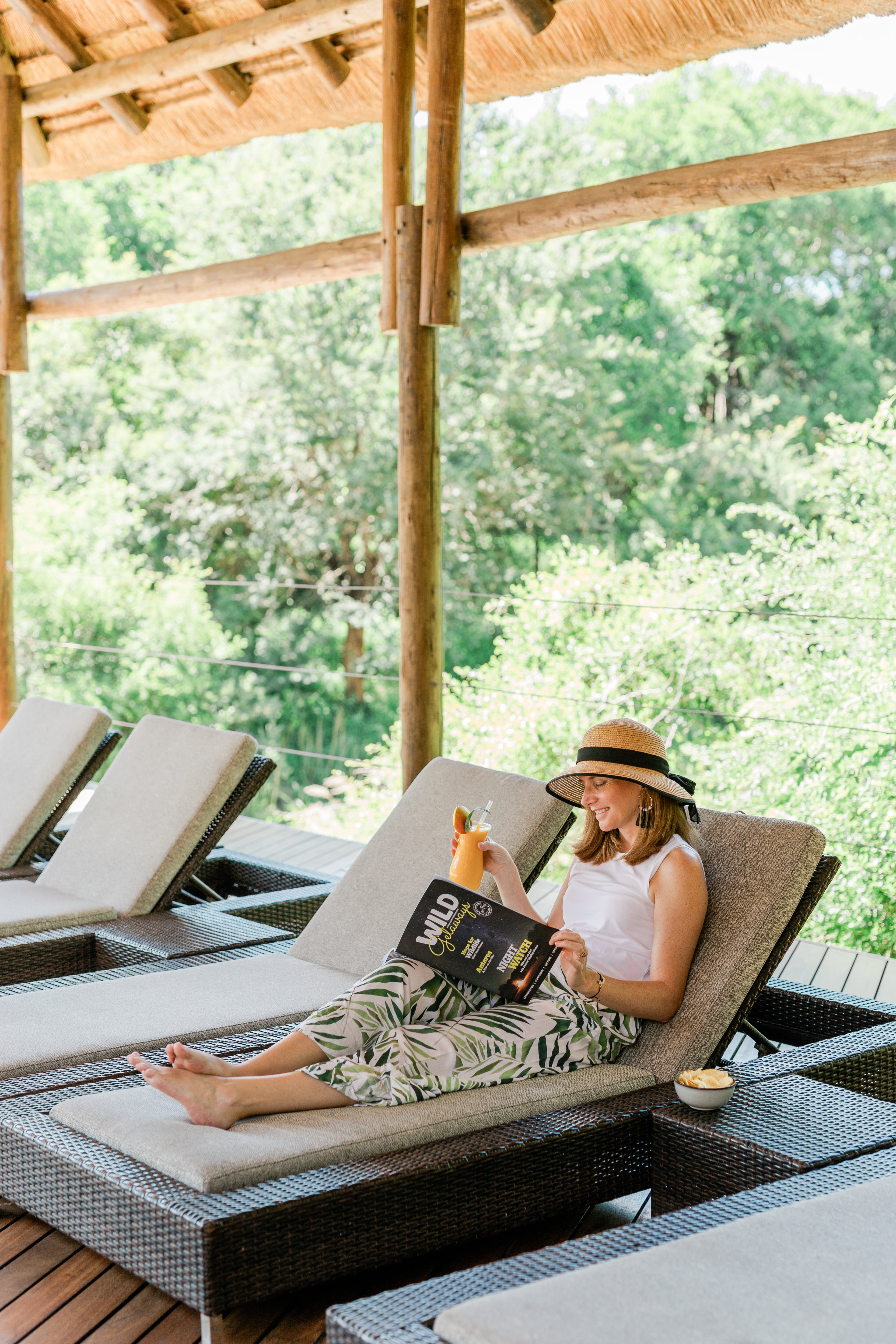 Moditlo River Lodge swimming pool lounge chairs