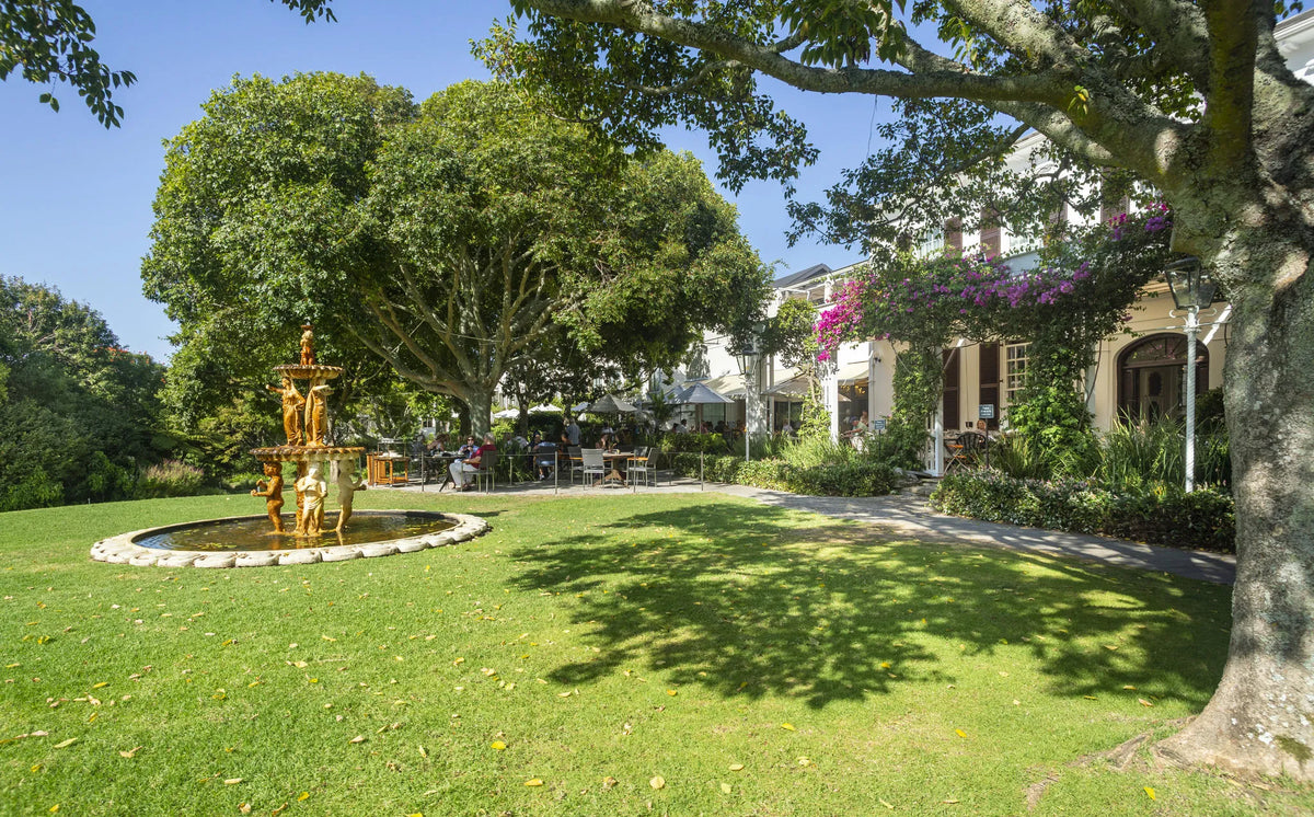 Lawns and fountain at Vineyard Hotel, Cape Town, South Africa.
