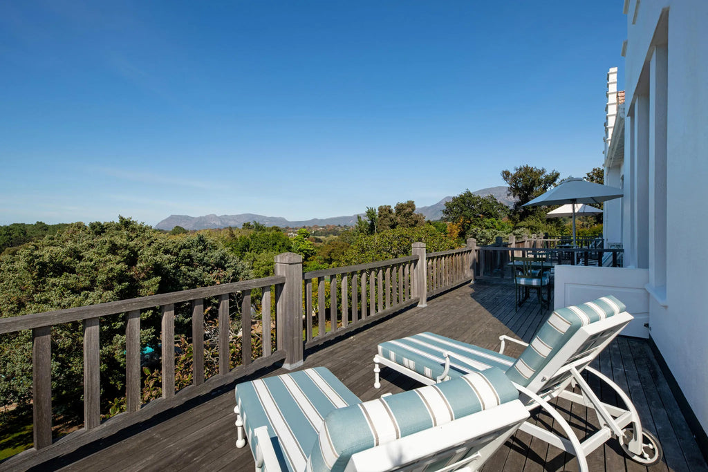 Luxury room with veranda at The Cellars Hohenort, Cape Town, South Africa.