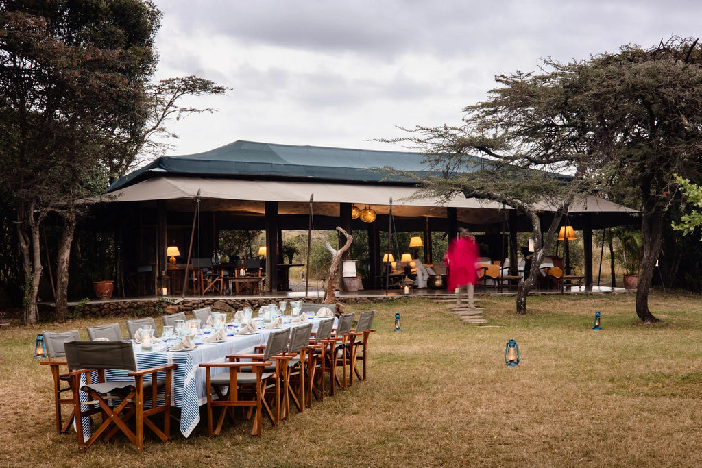 Outdoor Dining at Hemingways River Camp Mara, Mara North Conservancy, Kenya.