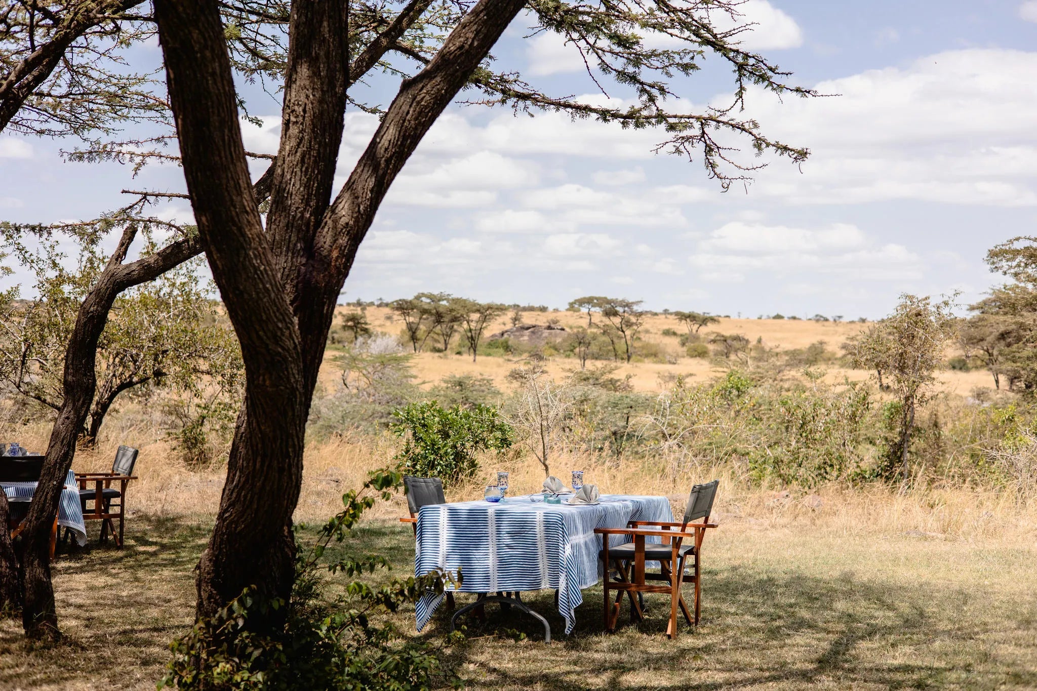 Bush Dining at Hemingways River Camp Mara, Mara North Conservancy, Kenya.