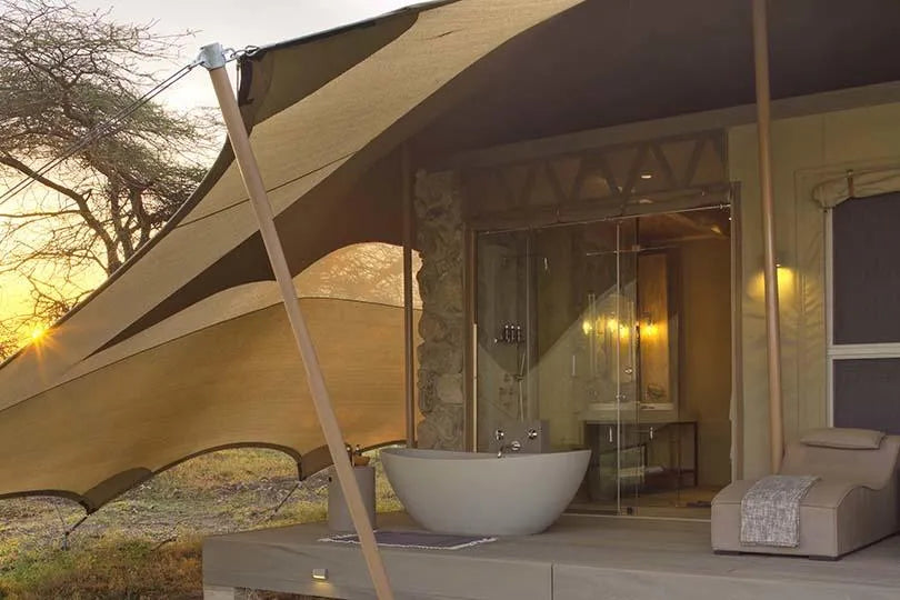 Namiri Plains - Tent Deck With Outdoor Bath at Namiri Plains Camp, Eastern Serengeti, Tanzania.