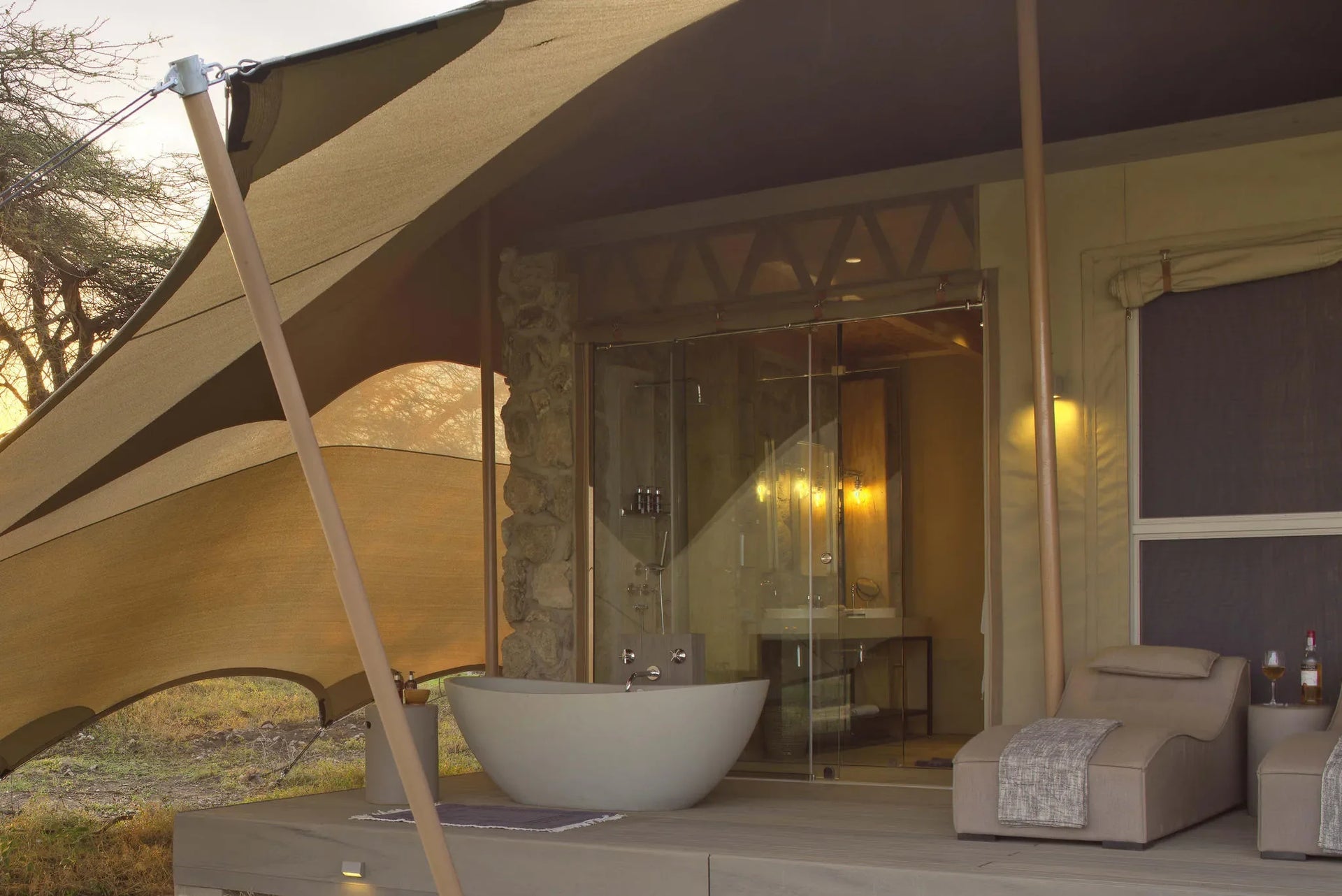 Namiri Plains - Guest Tent Deck Showing Bathroo at Namiri Plains Camp, Eastern Serengeti, Tanzania.