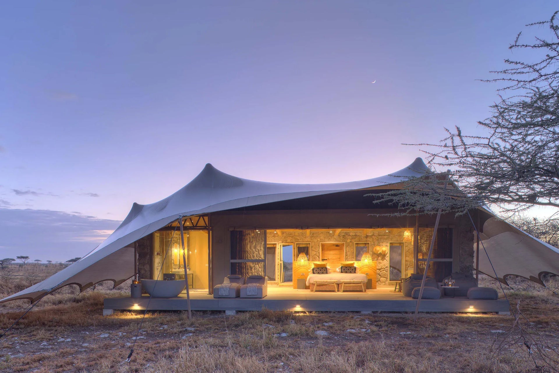 Namiri Plains - Tent Exterior at Dawn at Namiri Plains Camp, Eastern Serengeti, Tanzania.