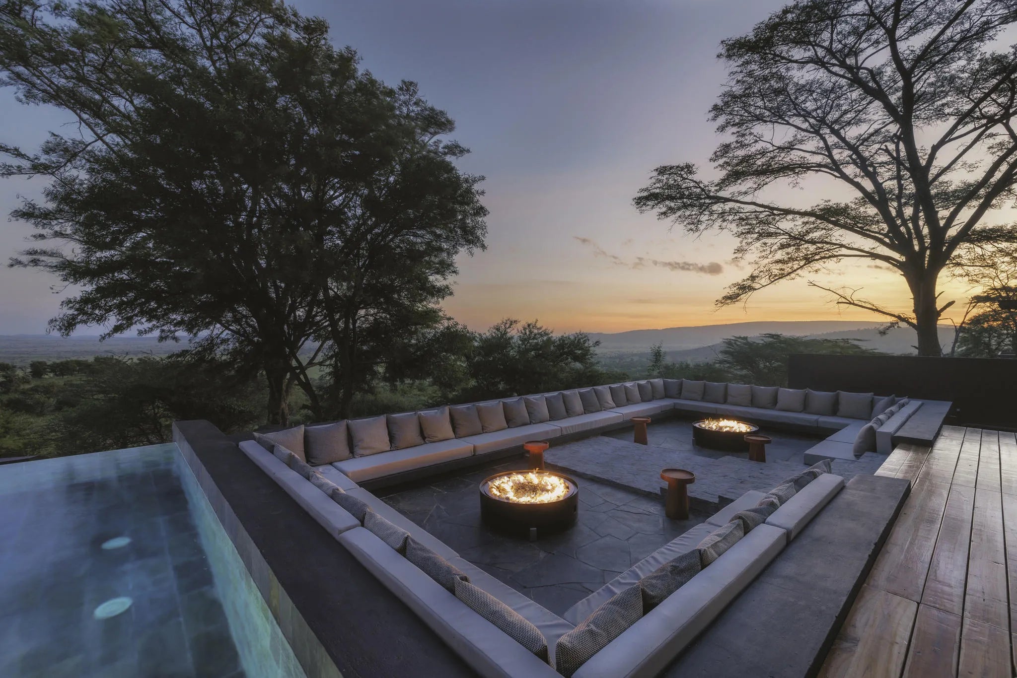 Fire Pit Sunrise Wide at Serengeti Explorer by Elewana Collection, Seronera, Tanzania.