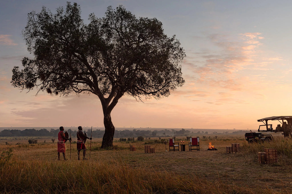 Sundowner at The Ritz-Carlton, Masai Mara Safari Camp, Masai Mara National Reserve, Kenya.