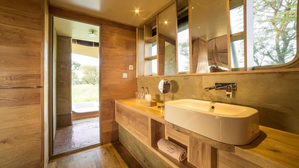 your luxury bathroom has everything you desire including a marine style flush toilet, power shower, hair dryer and hot tub