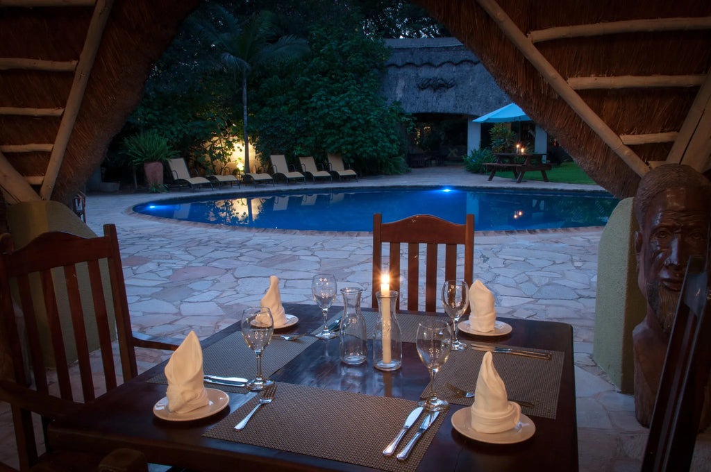 Pool side Dining at Bayete at Bayete Guest Lodge, Victoria Falls (Zimbabwe), Zimbabwe.