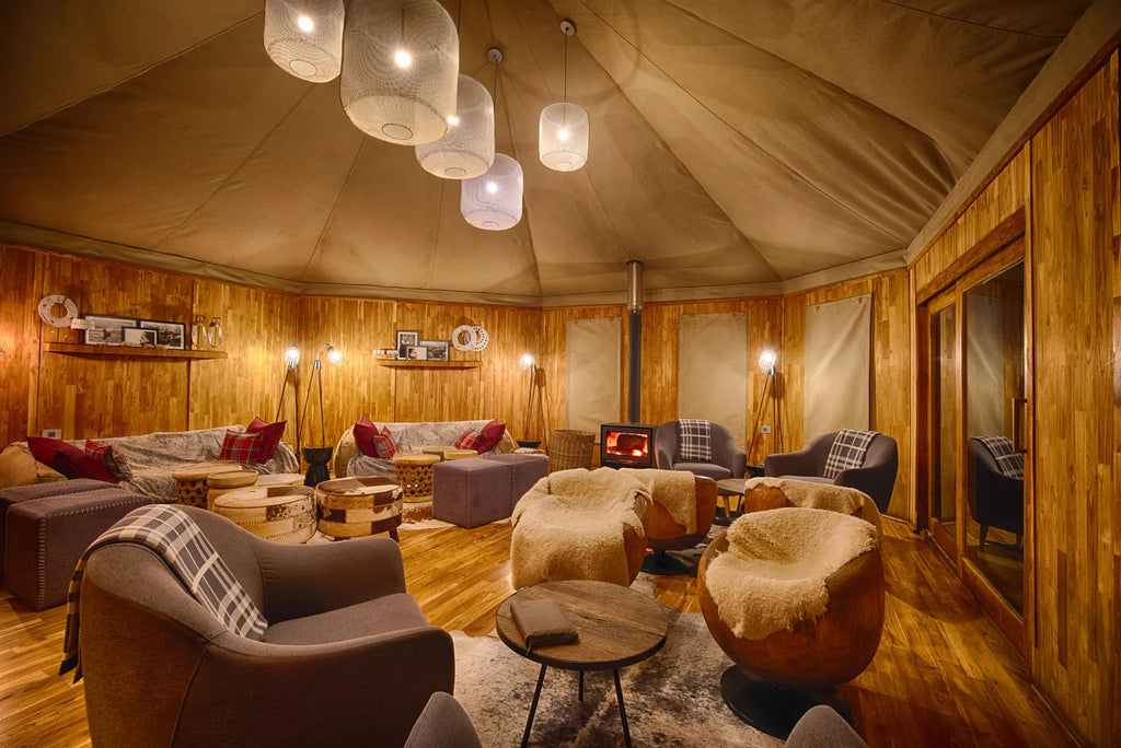 The Highlands - Cozy Lounge with Wood Burning Stove at The Highlands, Ngorongoro Crater, Tanzania.