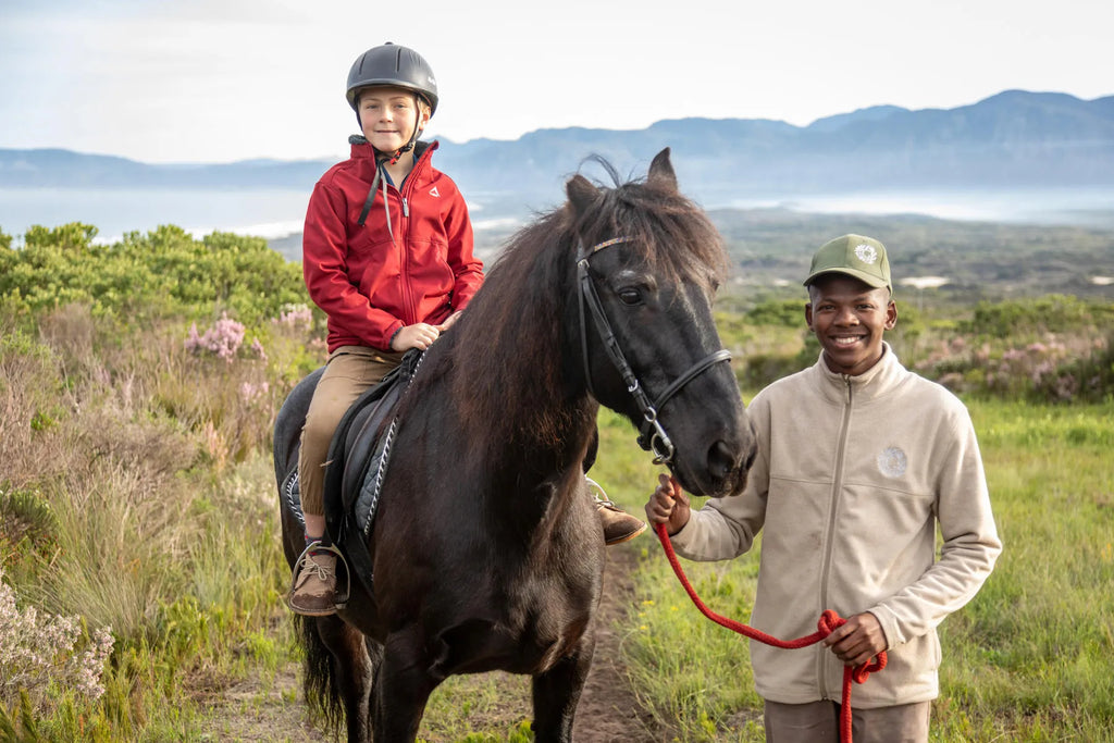Kiddies Pony Rides at Grootbos Private Nature Reserve Garden Lodge, De Kelders, South Africa.