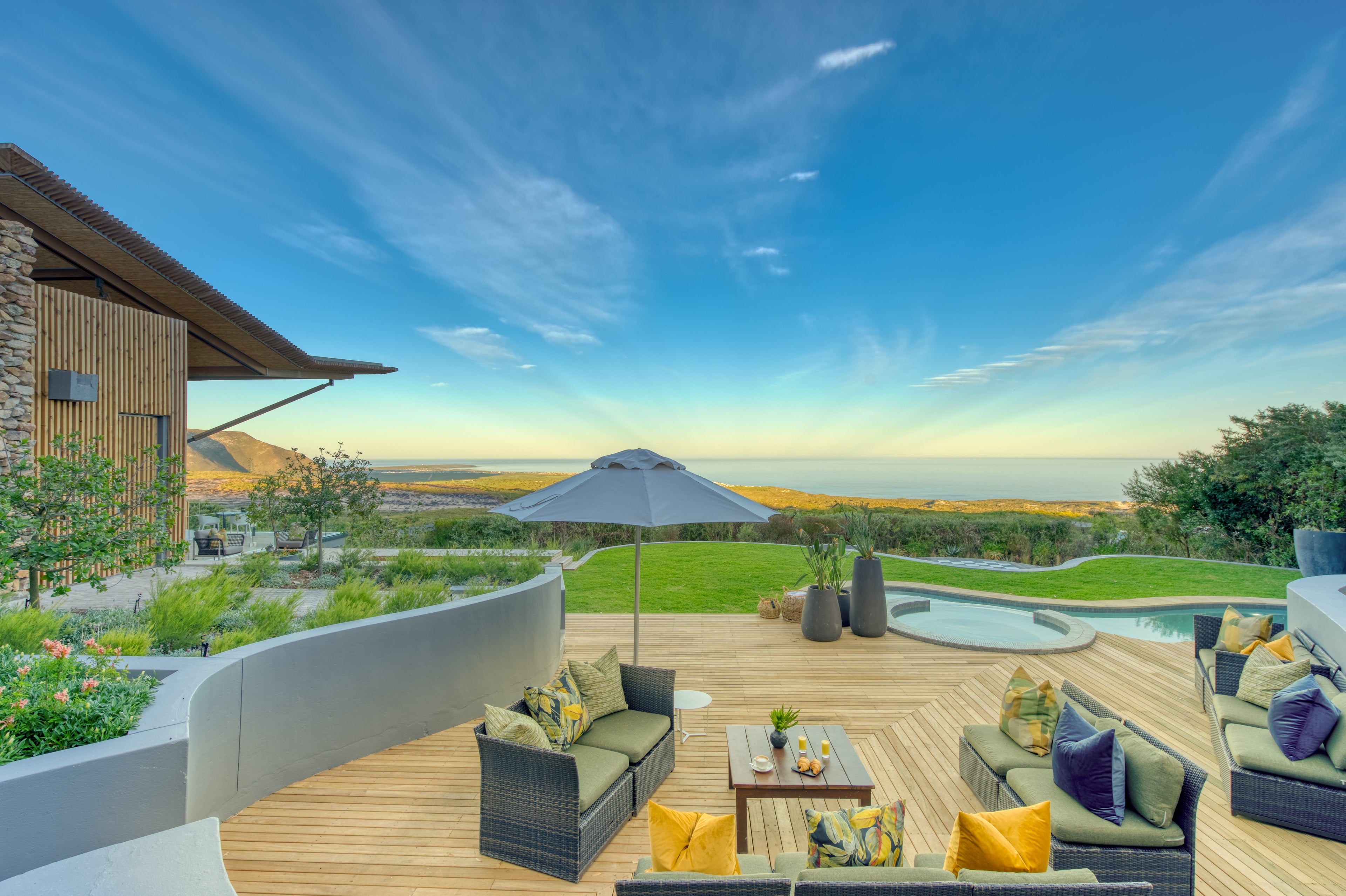 Garden Lodge outside area with pool