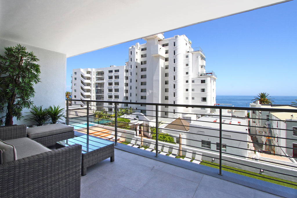 Spacious balcony with outdoor seating