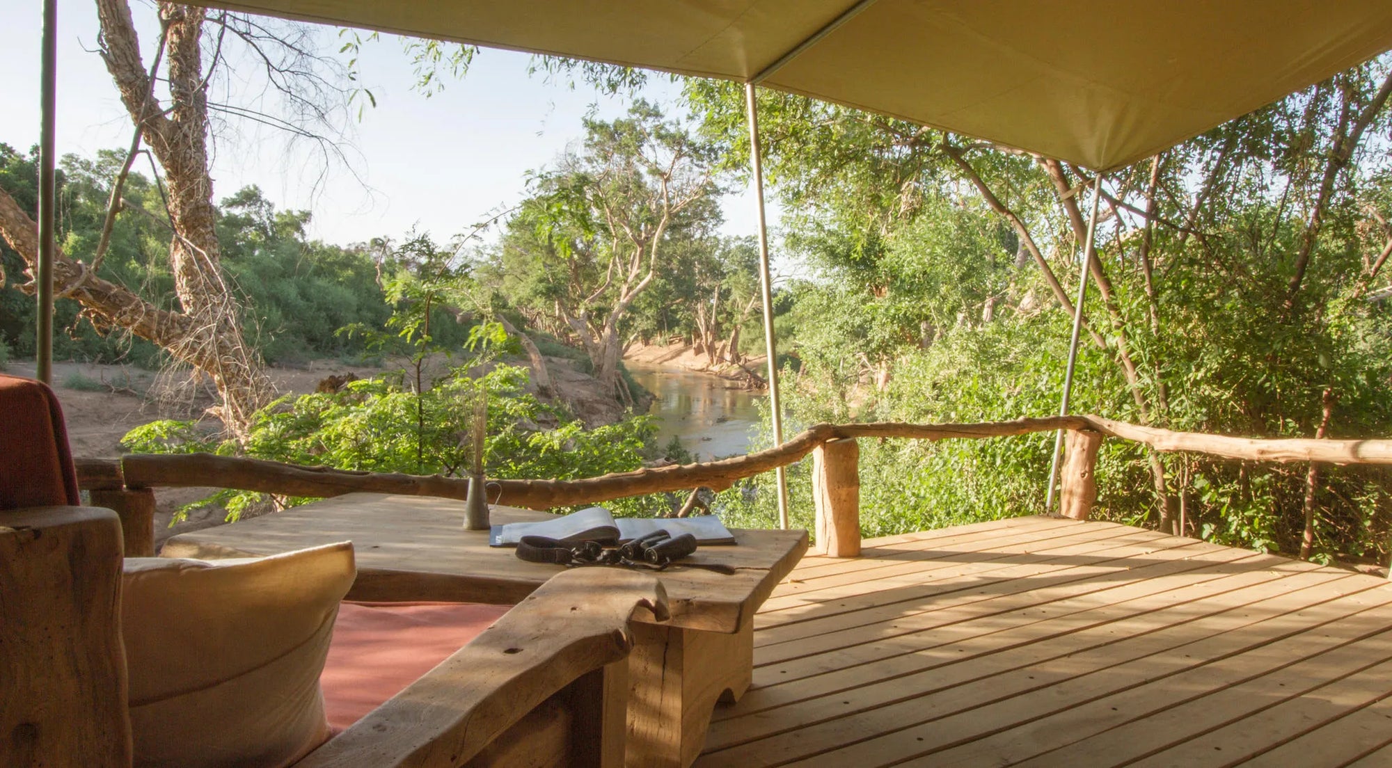 Large verandahs and comfortable fig sofas at Shompole Wilderness, Shompole Conservancy, Kenya.