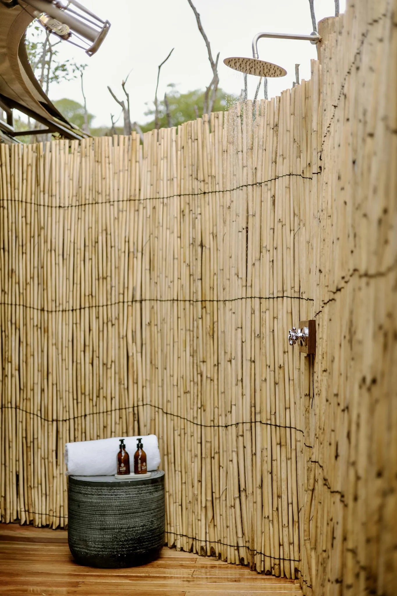 Encounter by Ongava guest tent outdoor shower at Encounter by Ongava, Ongava Private Game Reserve, Namibia.
