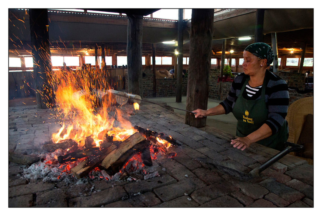 Preparing the fire for a braai