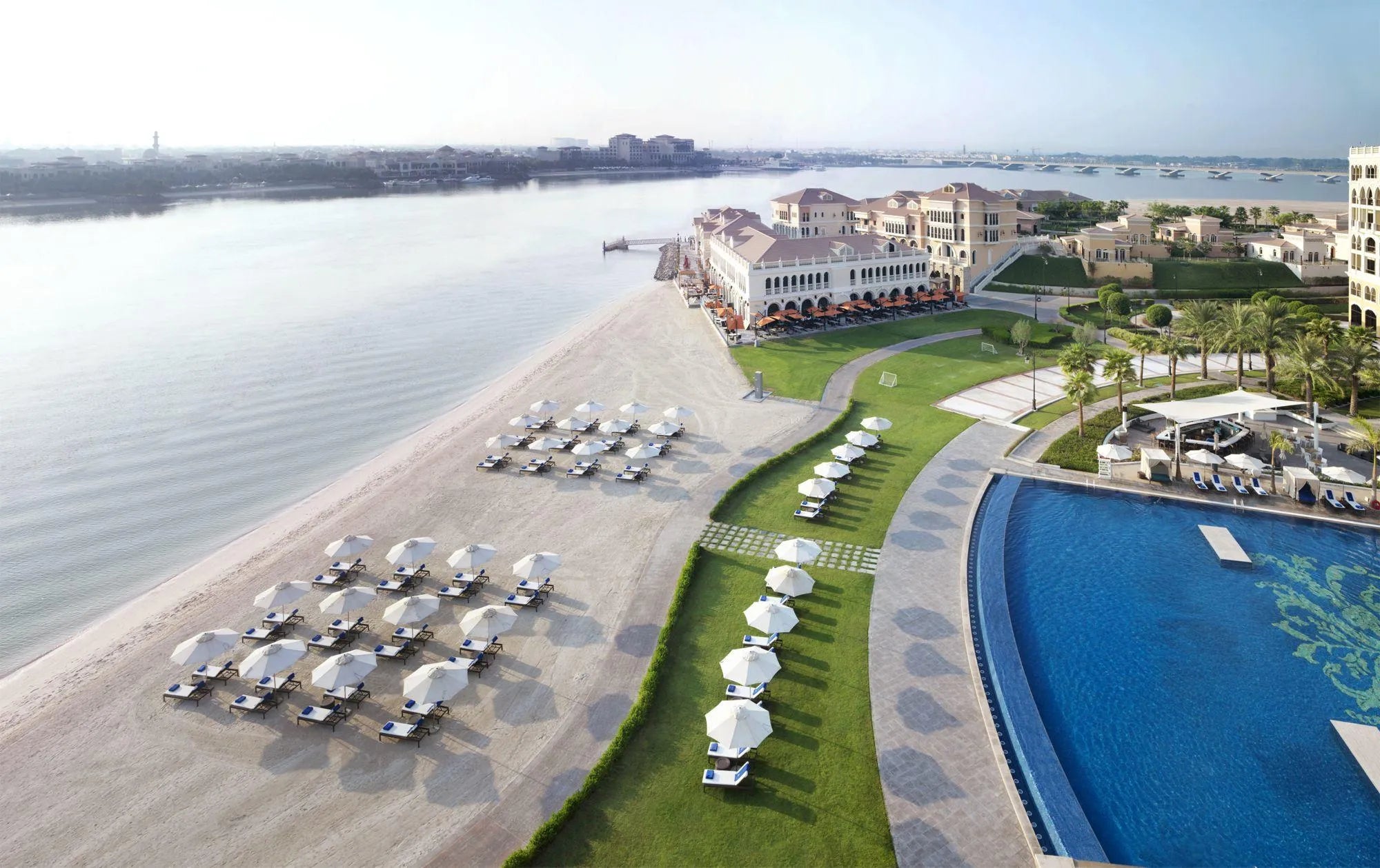 Private Beach at The Ritz-Carlton Abu Dhabi Grand Canal, Abu Dhabi, United Arab Emirates.