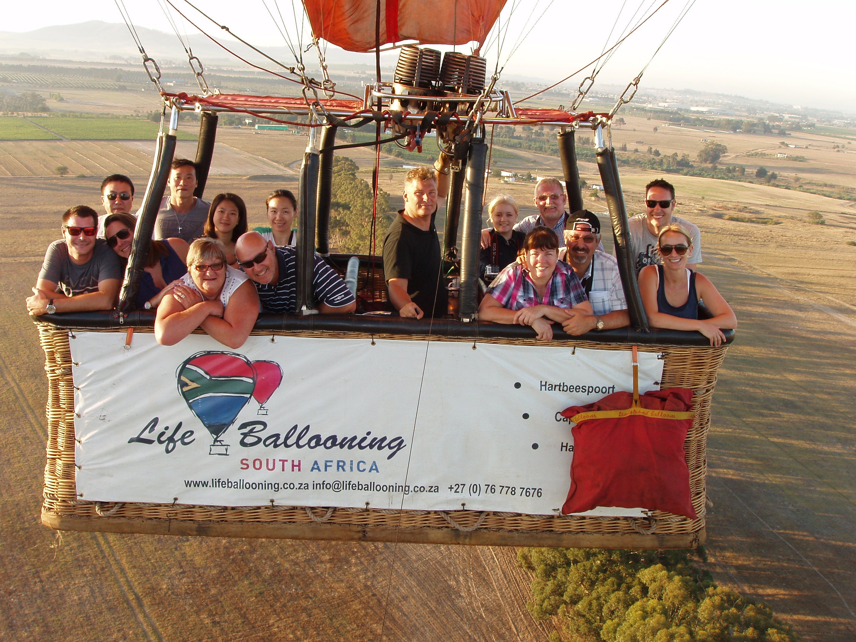 In-flight photograph of Pilot Conrad van Wyk and passengers