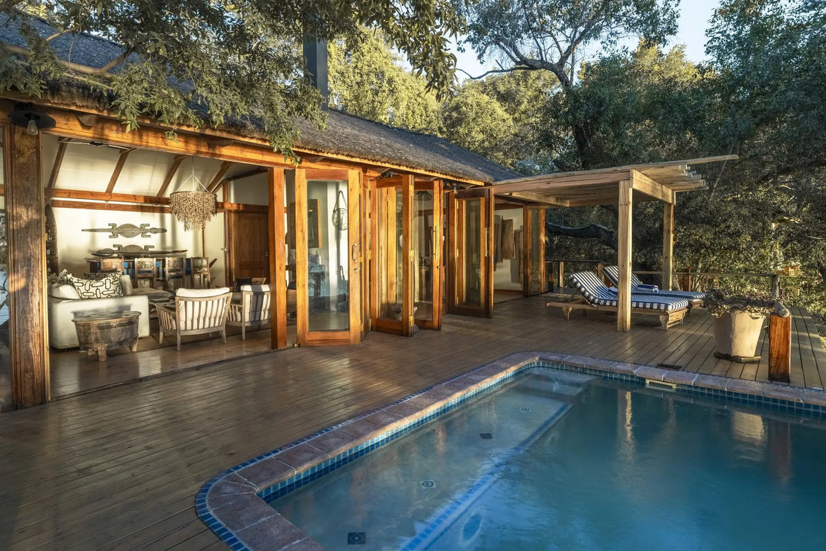 Dog House Private Plunge Pool and Shared Living/Dining/Bar Area at Tongabezi Lodge, Victoria Falls (Zambia), Zambia.