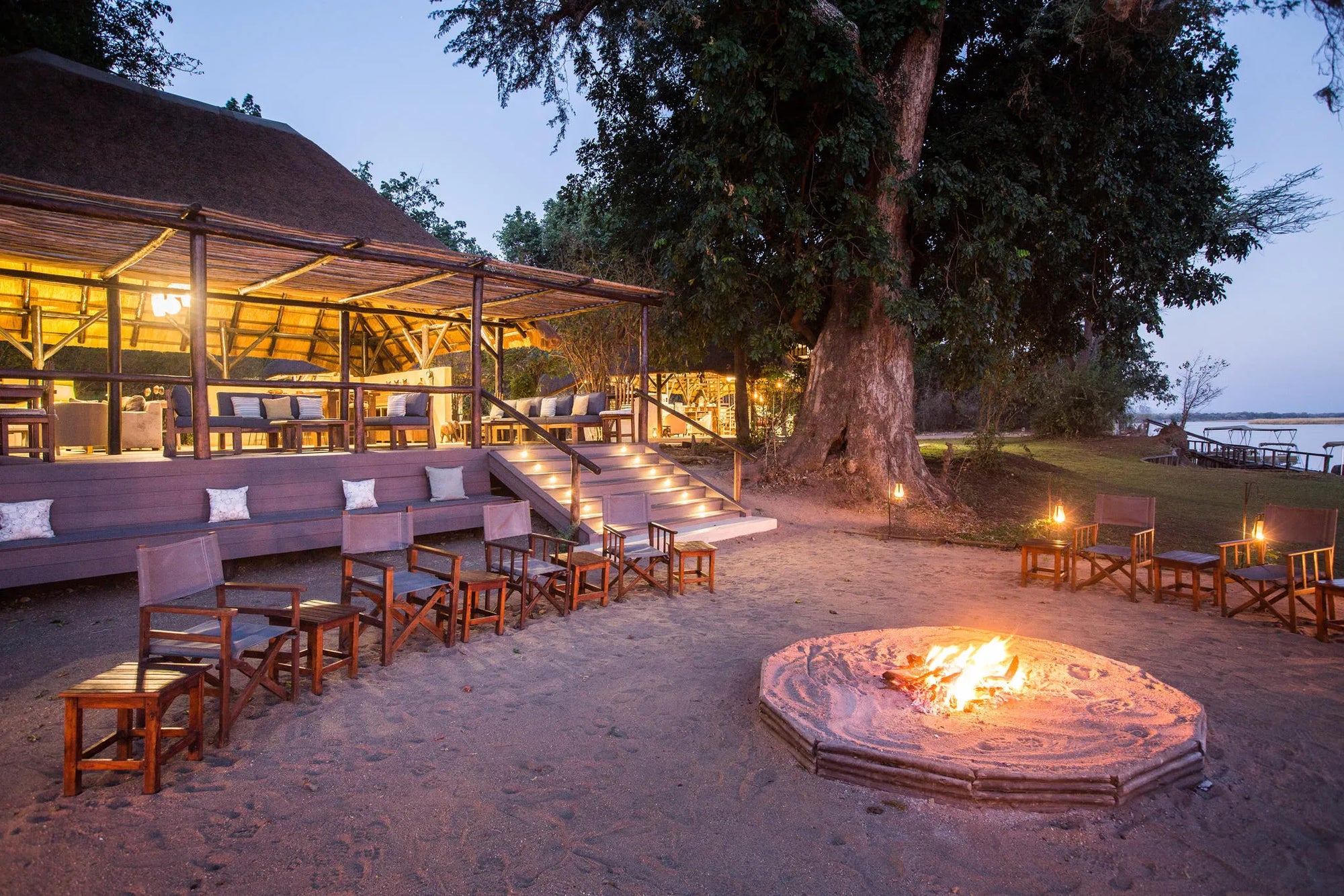 Chiawa Camp - campfire at sunset at Chiawa Safaris - Chiawa Camp, Lower Zambezi, Zambia.