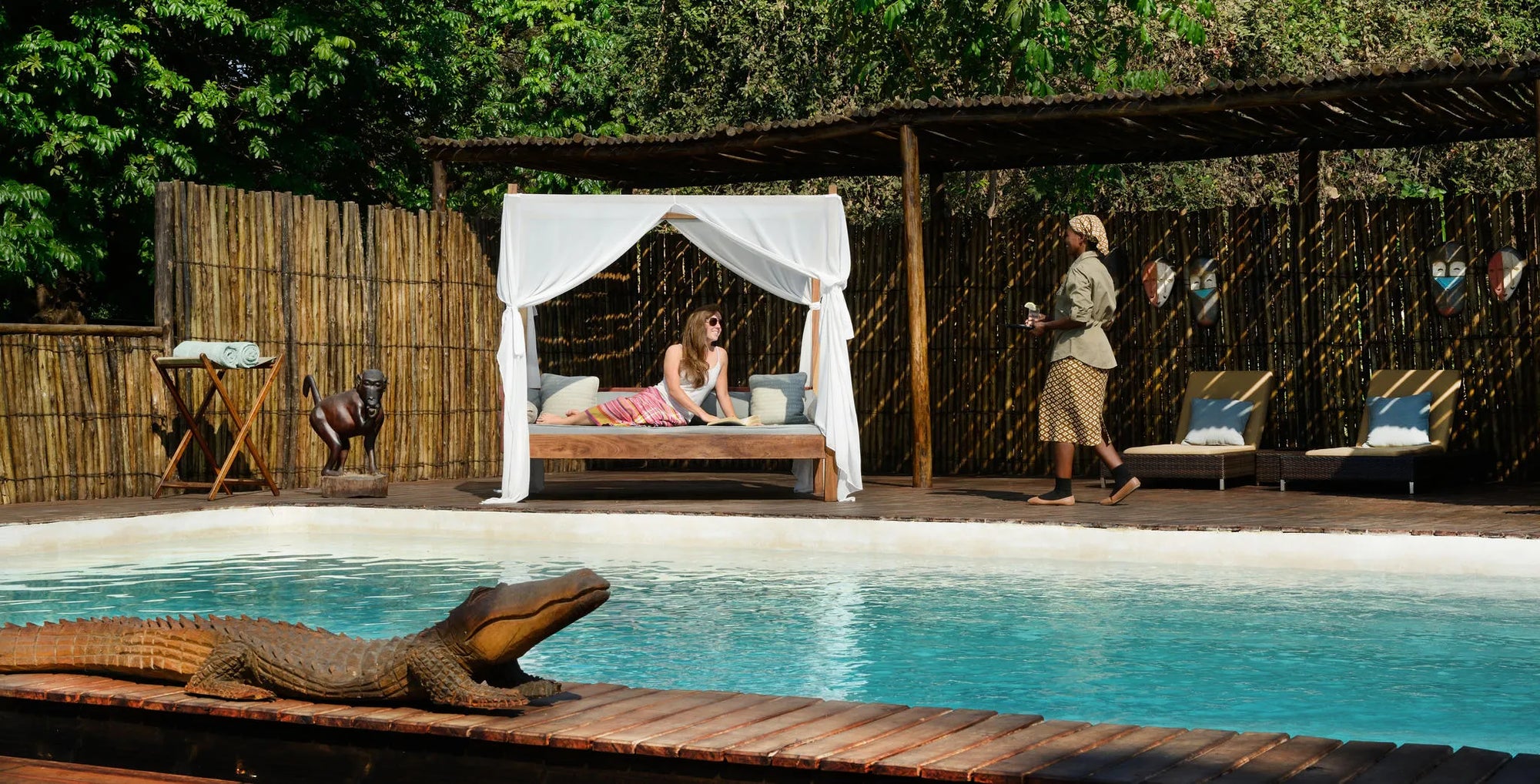 Chiawa pool and deck overlooking the Zambezi at Chiawa Safaris - Chiawa Camp, Lower Zambezi, Zambia.