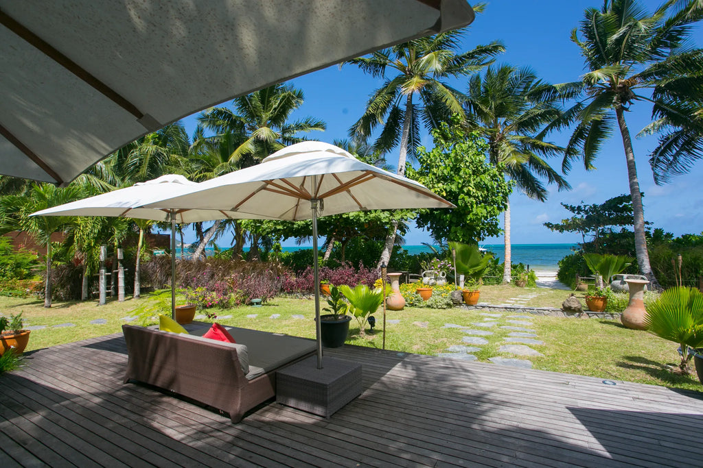 Sunbeds at Dhevatara Beach Hotel, Praslin Island, Seychelles.