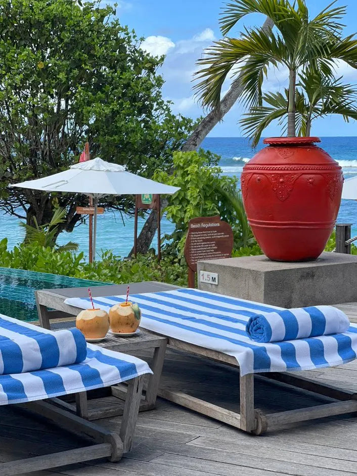 Pool Side at DoubleTree by Hilton Seychelles Allamanda Resort and Spa, Mahe Island, Seychelles.
