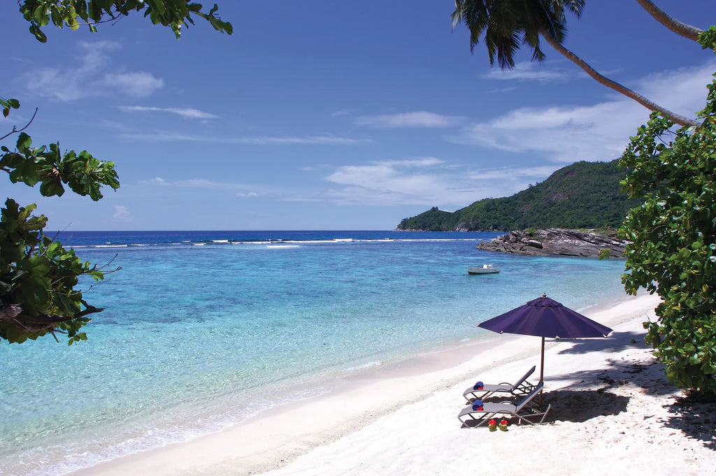 Beach at DoubleTree by Hilton Seychelles Allamanda Resort and Spa, Mahe Island, Seychelles.