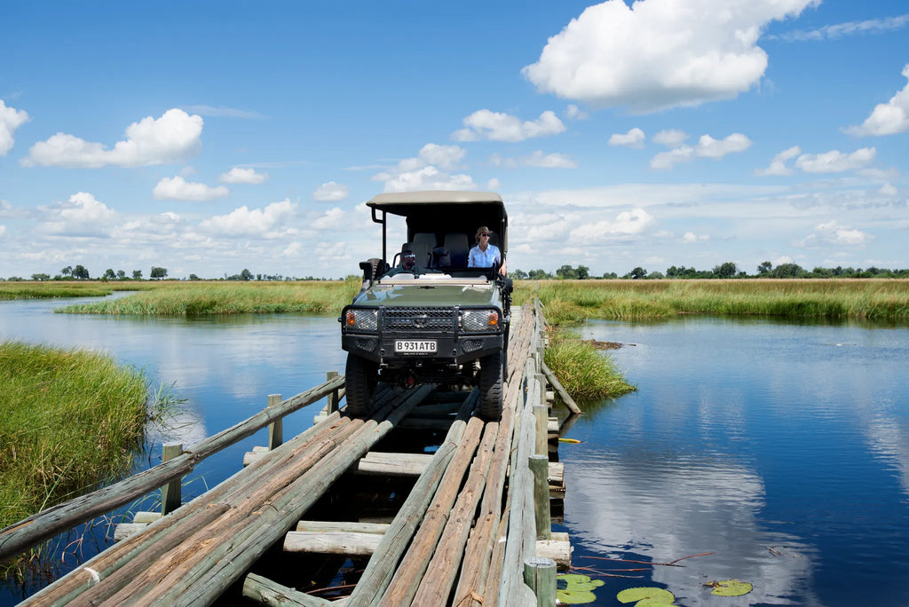 Crossing the Bridge at Duba Plains Camp, Duba Plains Private Reserve, Botswana.