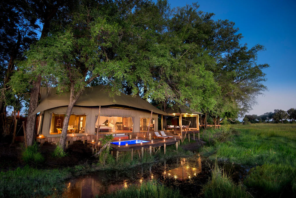 Duba Plains Guest Suite Evening Exterior View at Duba Plains Camp, Duba Plains Private Reserve, Botswana.
