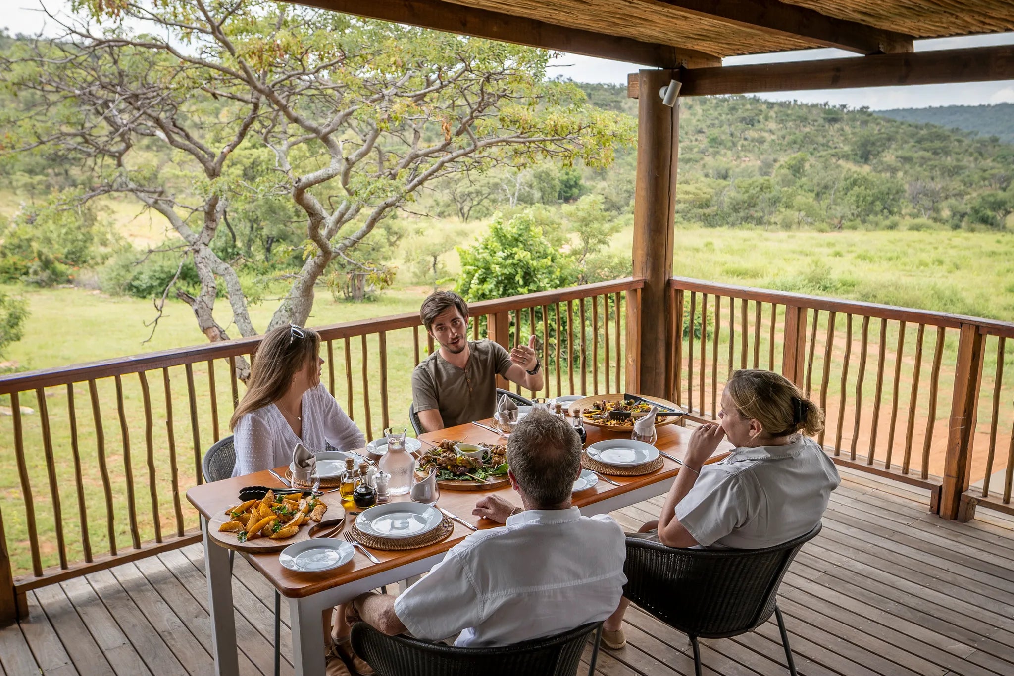 Lunch on the deck overlooking the watering hole at Ekuthuleni Lodge, Welgevonden Game Reserve, South Africa.