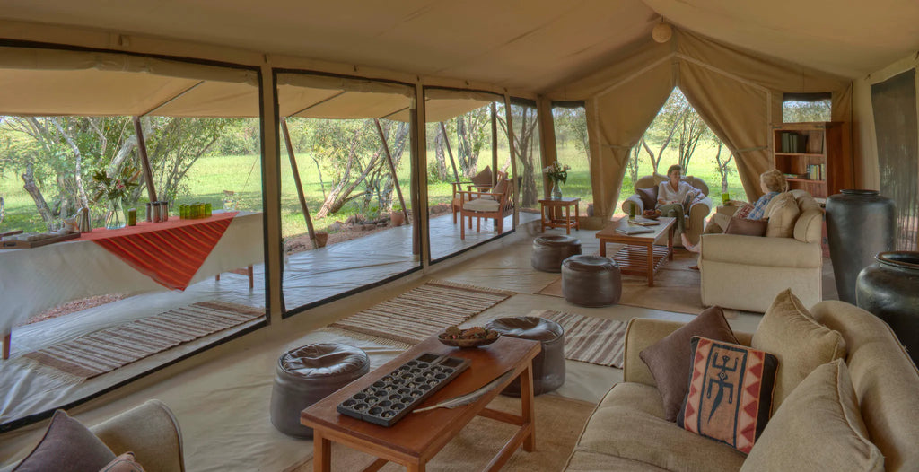 Asilia Africa | Encounter Mara - Guest lounge and patio at Encounter Mara, Mara Naboisho Conservancy, Kenya.