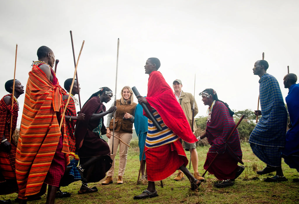 Maasai dance with guests at Entamanu Ngorongoro, Ngorongoro Crater, Tanzania.