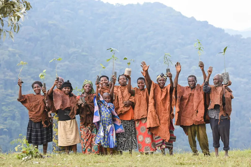 Erebero Hills - Batwa Family at Erebero Hills, Bwindi Impenetrable Forest National Park, Uganda.