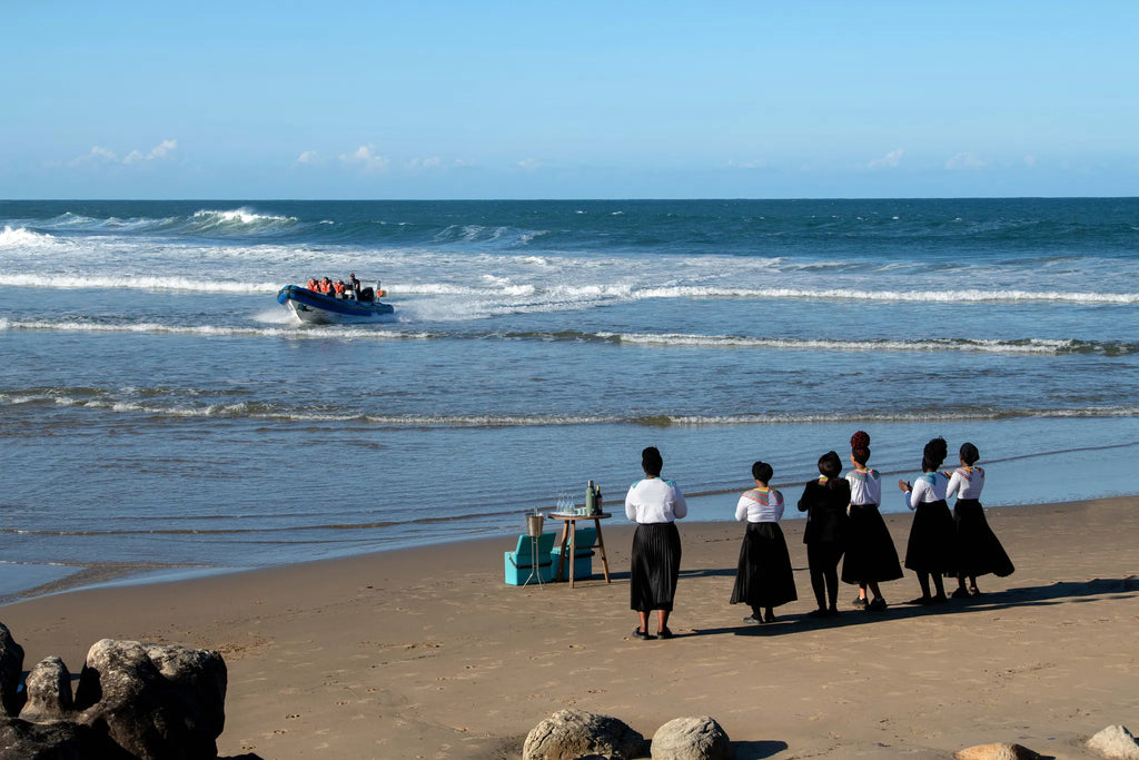 boat arrival at GweGwe Beach Lodge, The Wild Coast, South Africa.