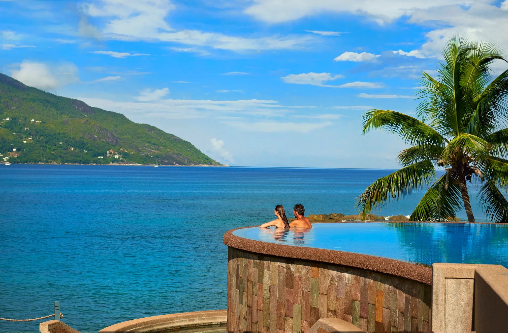 Infinity swimming pool at Hilton Seychelles Northolme Resort & Spa, Mahe Island, Seychelles.