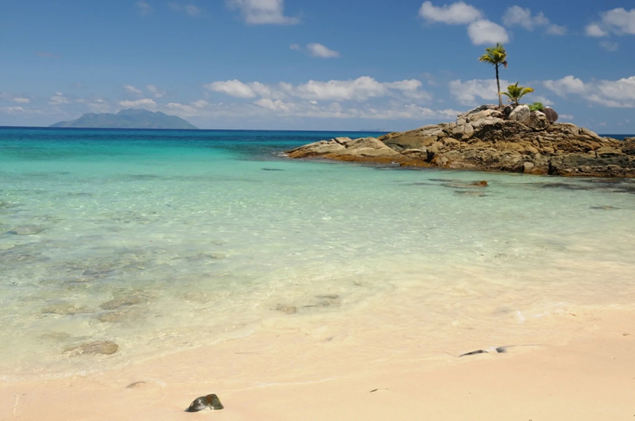 The beach at Hilton Seychelles Northolme Resort & Spa, Mahe Island, Seychelles.